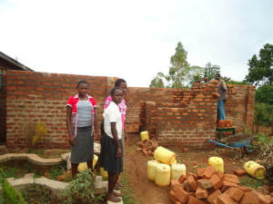 The Poultry Project, underway! (in the picture, L-R, Carolynne, Everlyne, and Miriam)